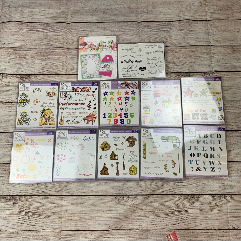 See D’s Set if 12 Stamp Sets New and Used Various Themes